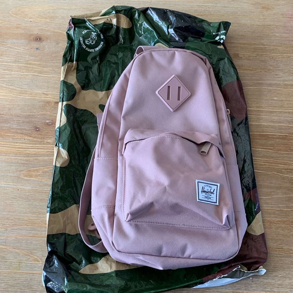 Like nee never used Herschel sling bag.